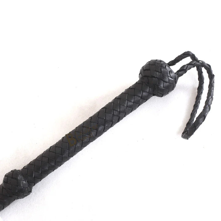 Close-up of 6ft black leather bullwhip handle – LB Whip with Turks Head Knot and wrist loop, handcrafted from real cowhide